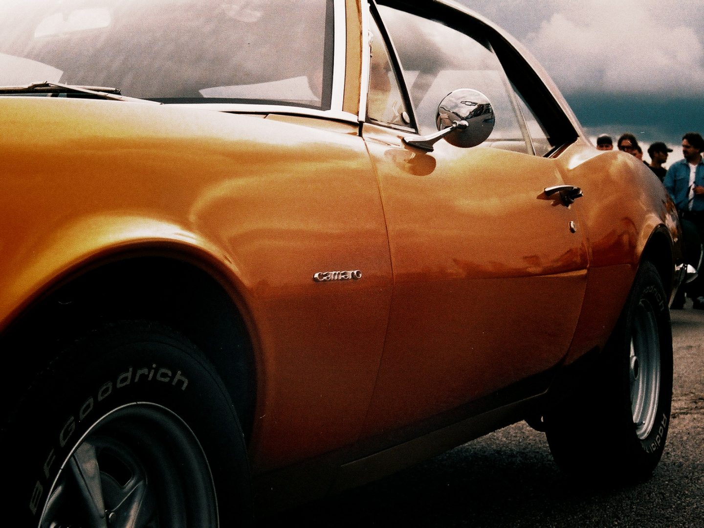 buying your first car - orange camero